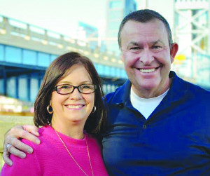 Wayne and Jodi happily taking a picture together